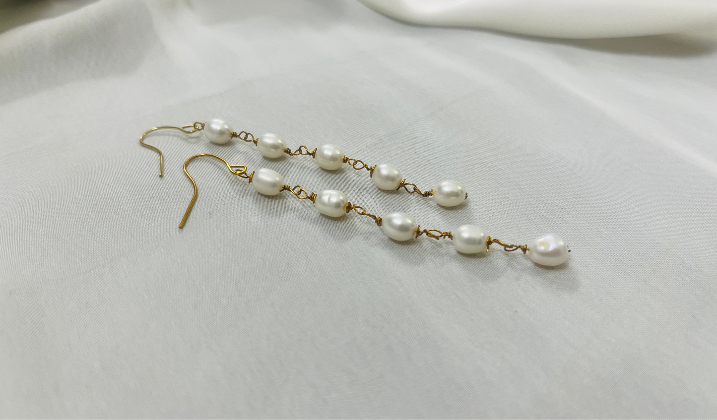 Long Pearl Lustre String Earrings