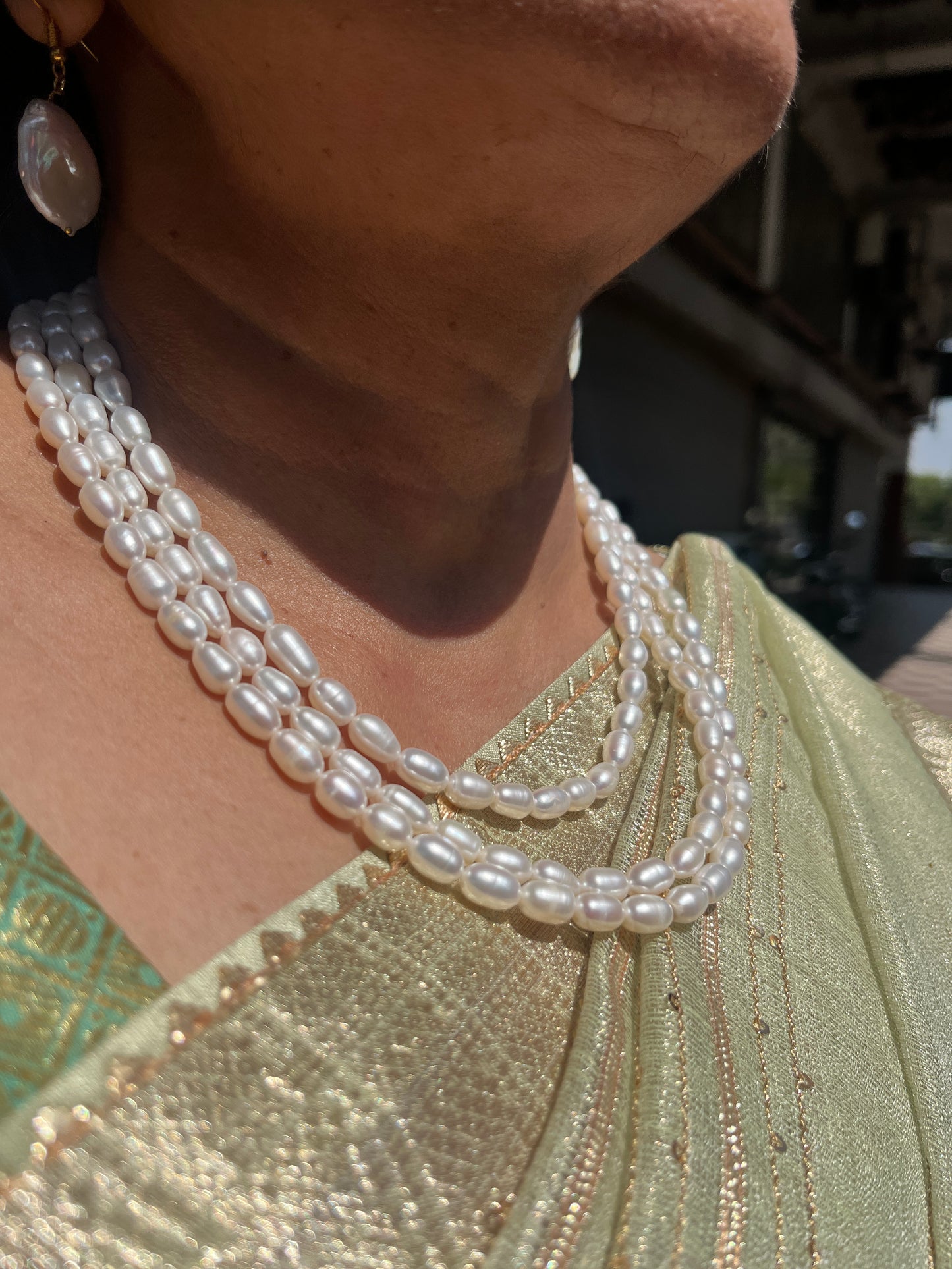 Queen Triple layered oval pearl Necklace