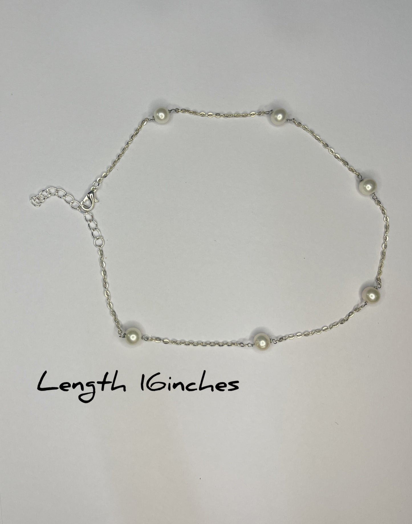 Spaced round pearl necklace