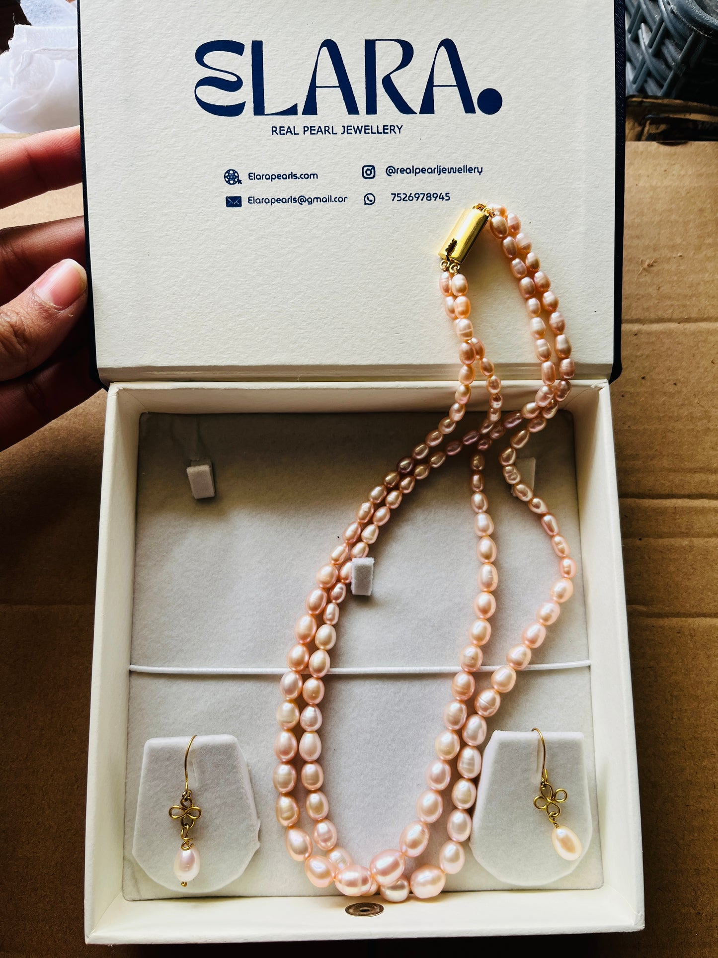 Flower drop oval pearl earrings