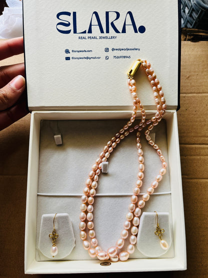 Flower drop oval pearl earrings