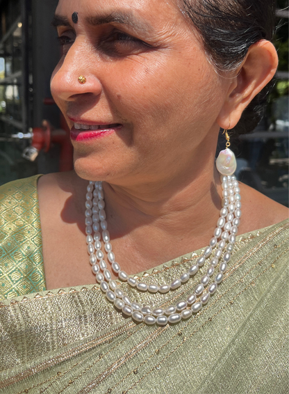 Queen Triple layered oval pearl Necklace