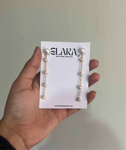 Long string oval pearl earring