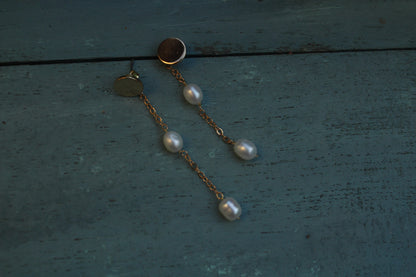 Long string oval pearl earring