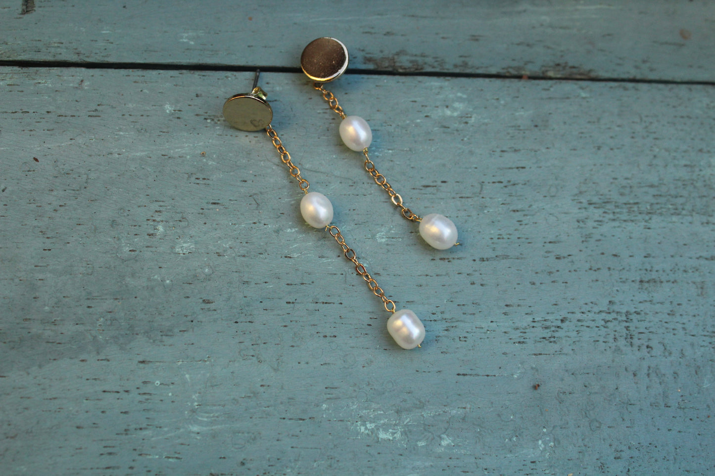 Long string oval pearl earring