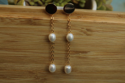 Long string oval pearl earring